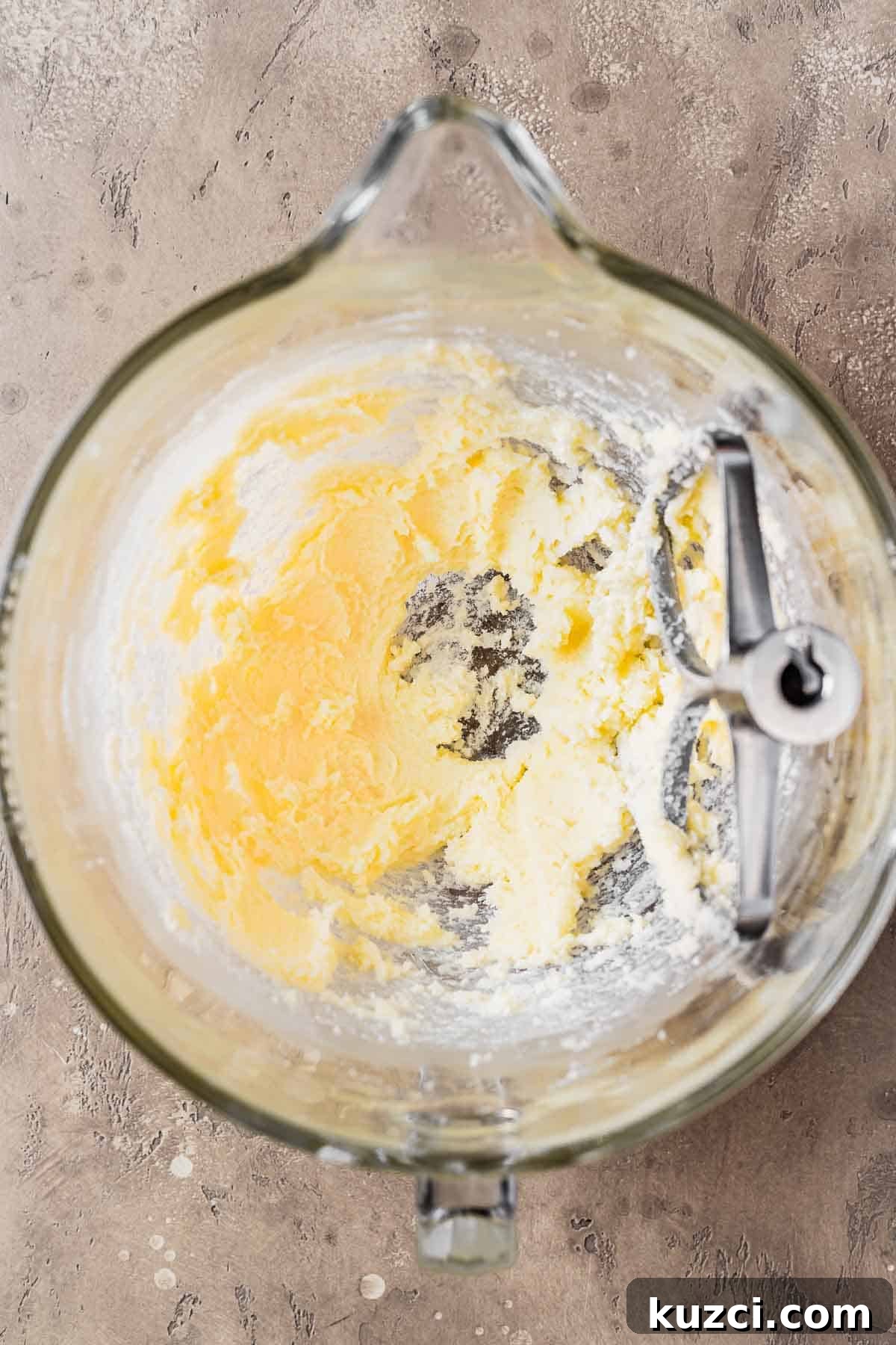 Creamed sugar and butter in a mixing bowl.