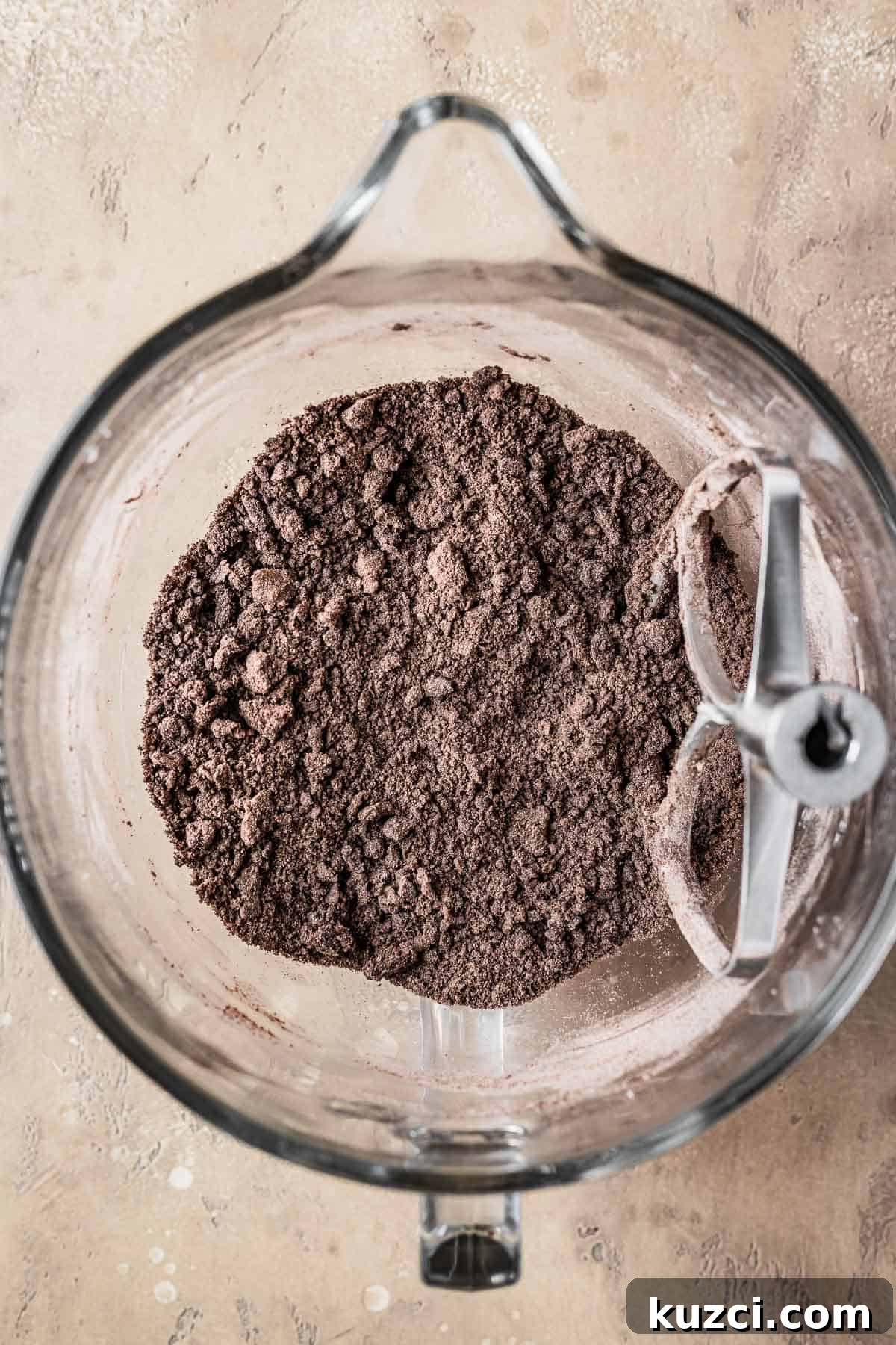 Dry ingredients blended with butter and sugar in a mixing bowl.