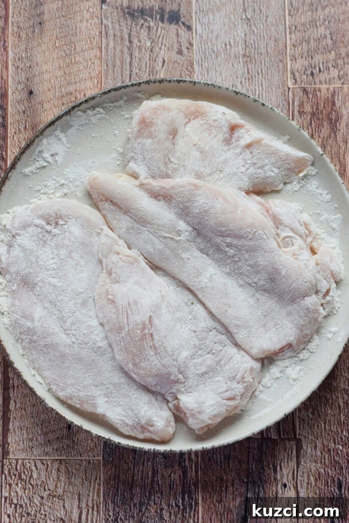 Skillet Chicken with Tomatoes and Spinach Recipe 6 Coating chicken in flour.