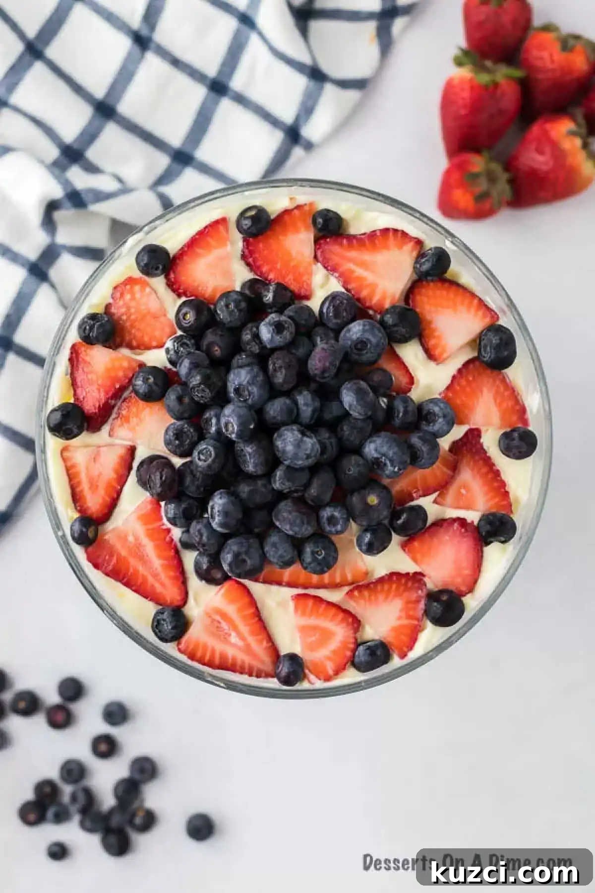 Red White and Blue Trifle Recipe for 4th of July 2 Red white and blue trifle in a glass container with strawberries and blueberries on top