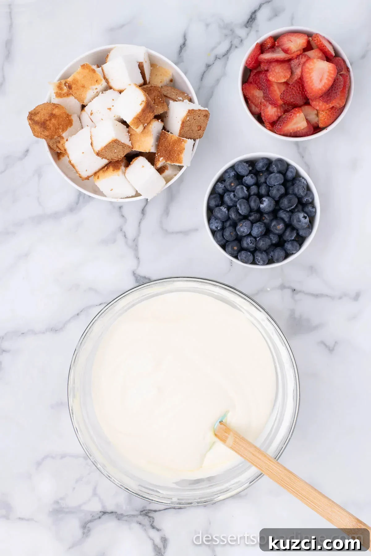 Red White and Blue Trifle Recipe for 4th of July 7 Combined whipped topping and pudding mixture in a bowl