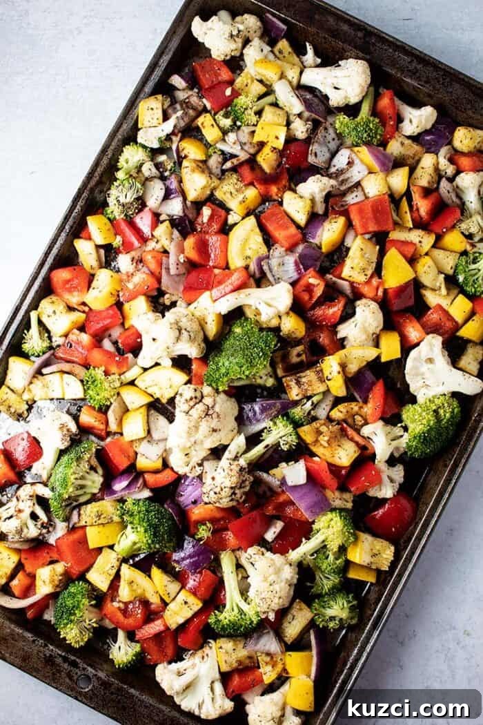 Keto Pepperoni Pizza Stuffed Peppers 11 overhead view of large baking sheet of keto roasted vegetables