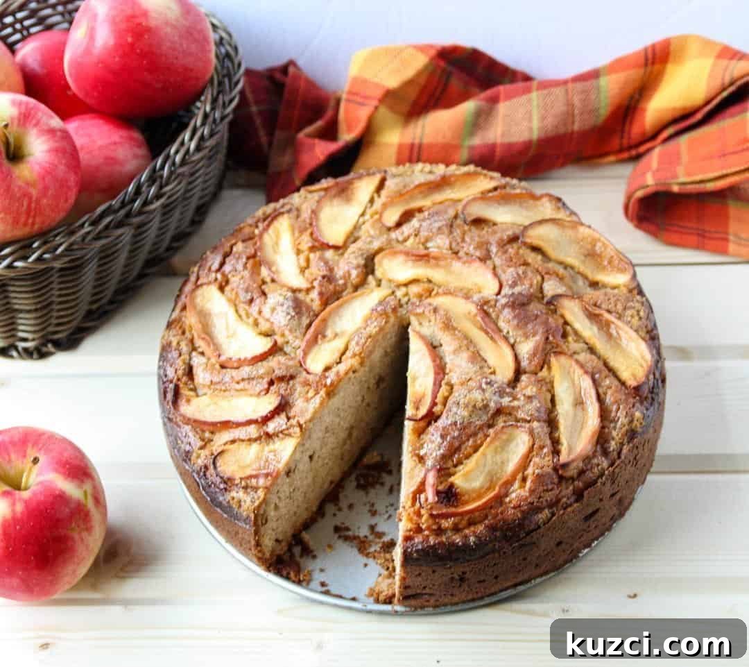 A cake on a plate with a slice cut out