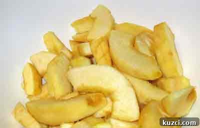 quince cut into wedges for greek recipe beef with quince moschari me kydonia.