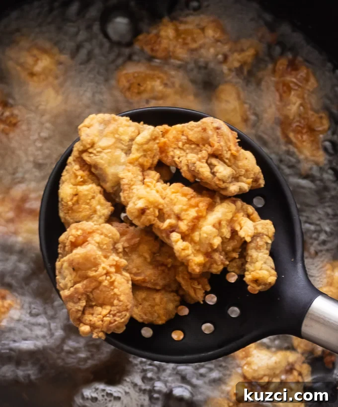 Crispy Sweet and Sour Chicken Recipe That Beats Takeout 4 Crispy fried chicken fresh out of the oil