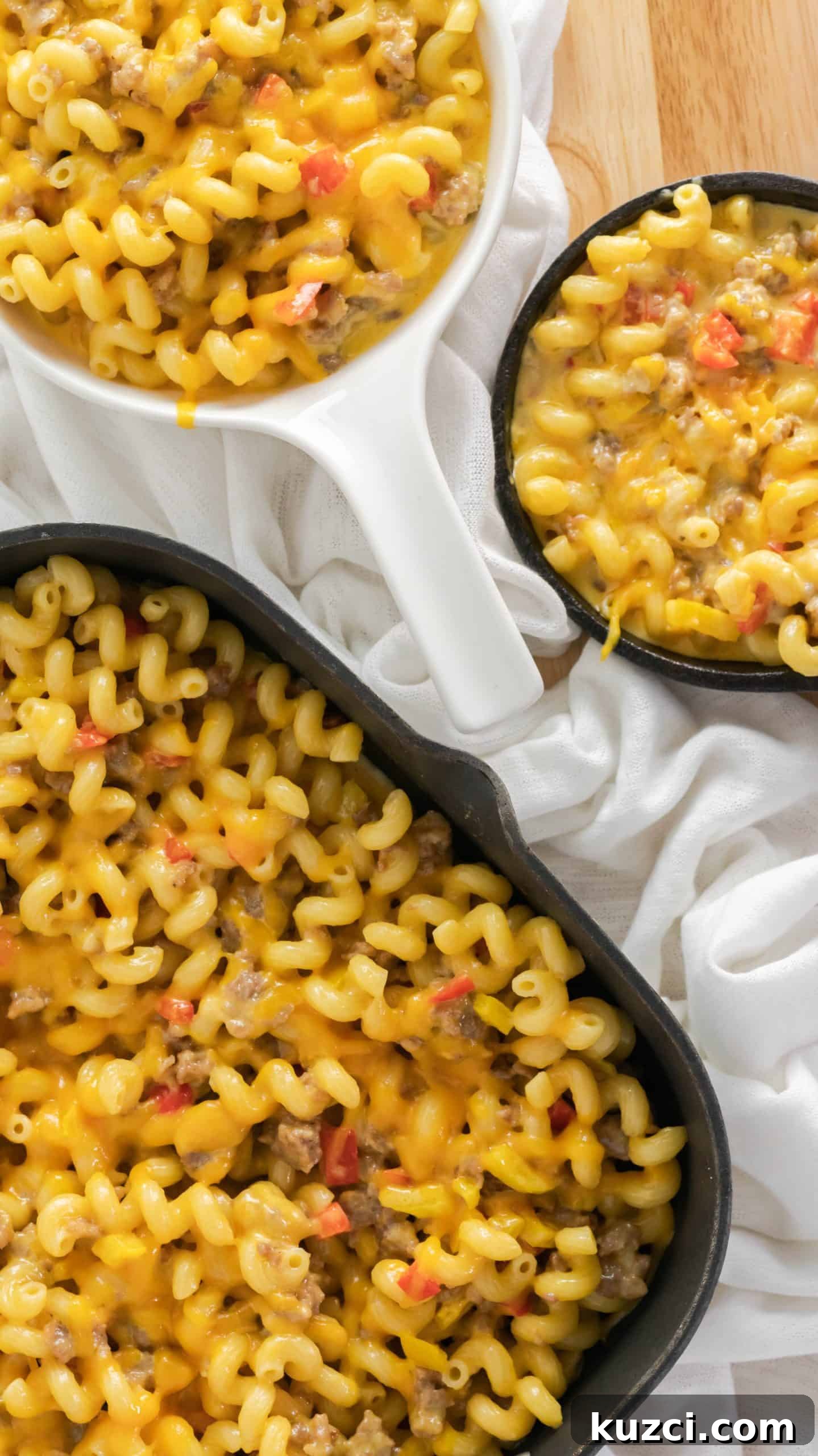 Sausage and Peppers Mac and Cheese Recipe 3 Square cast iron skillet with sausage and peppers mac and cheese and two mini skillets.