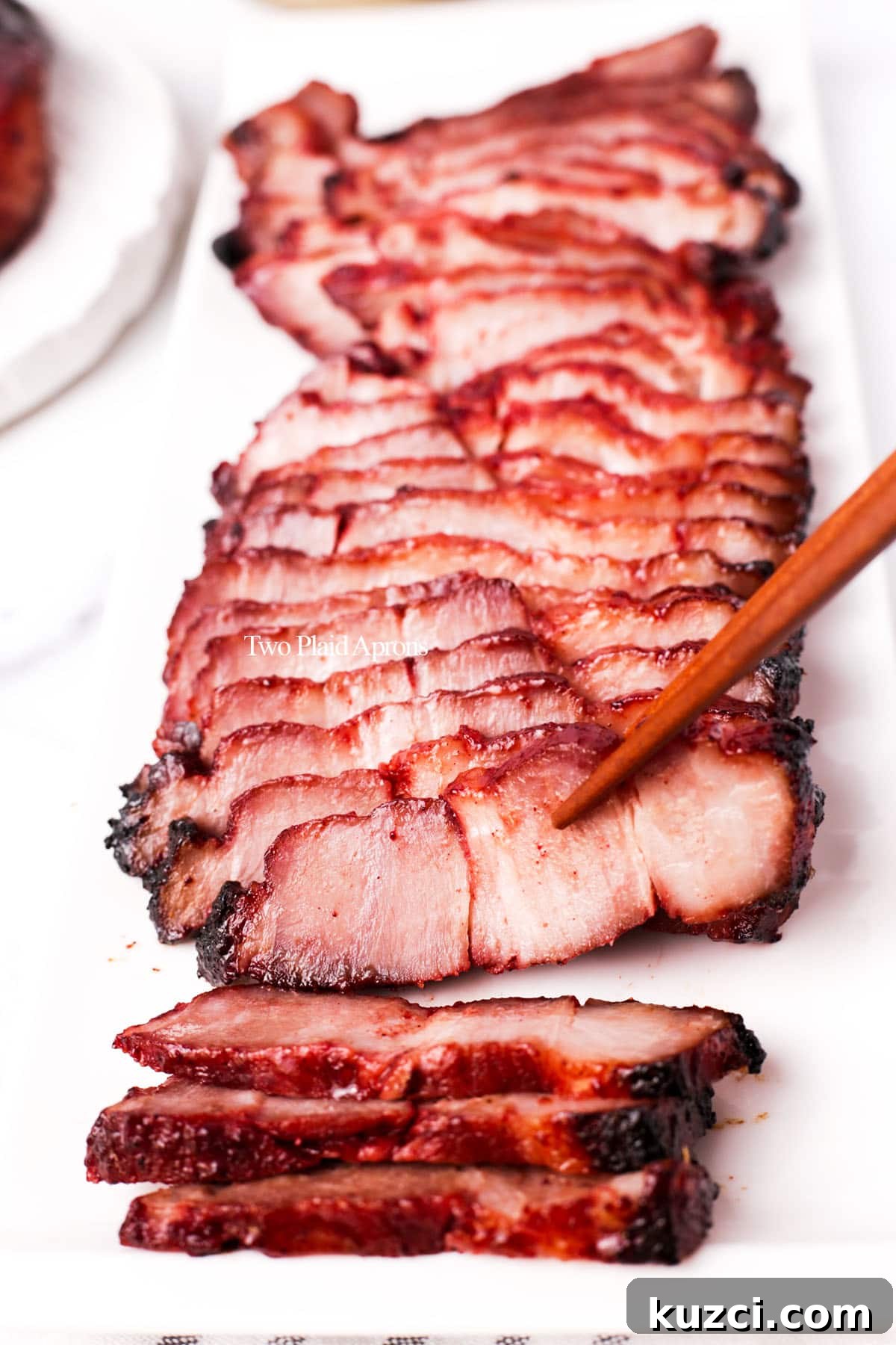 Sticky Char Siu Chicken: Cantonese BBQ Chicken Recipe 3 Char siu chicken on a plate.