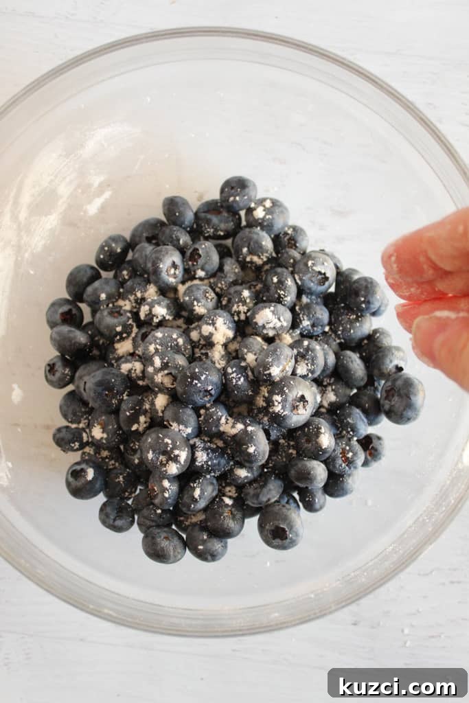 Moist Gluten Free Blueberry Cake Recipe 7 blueberries in a glass bowl
