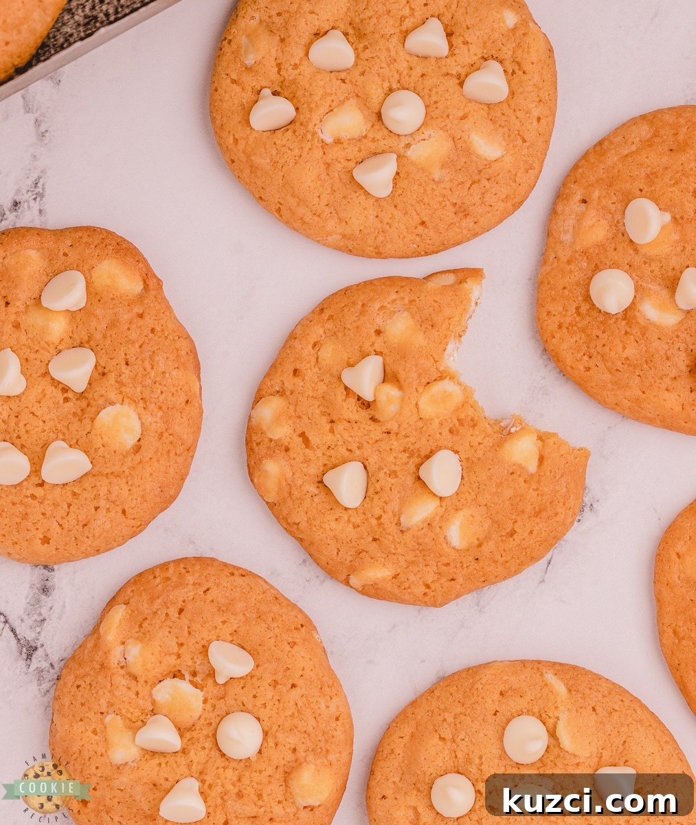 Classic Chewy Butterscotch Pudding Cookies 9 bite out of a cookie with white chocolate chips