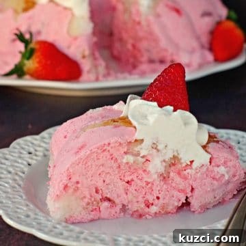 Piece of strawberry jello angel food cake on white plate with whole cake in background
