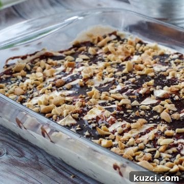 Drumstick Dessert in a glass pan on a wooden surface
