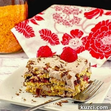 a piece of lentil dessert lasagna on a white plate with jar of red lentils and red and white tea towel in the background