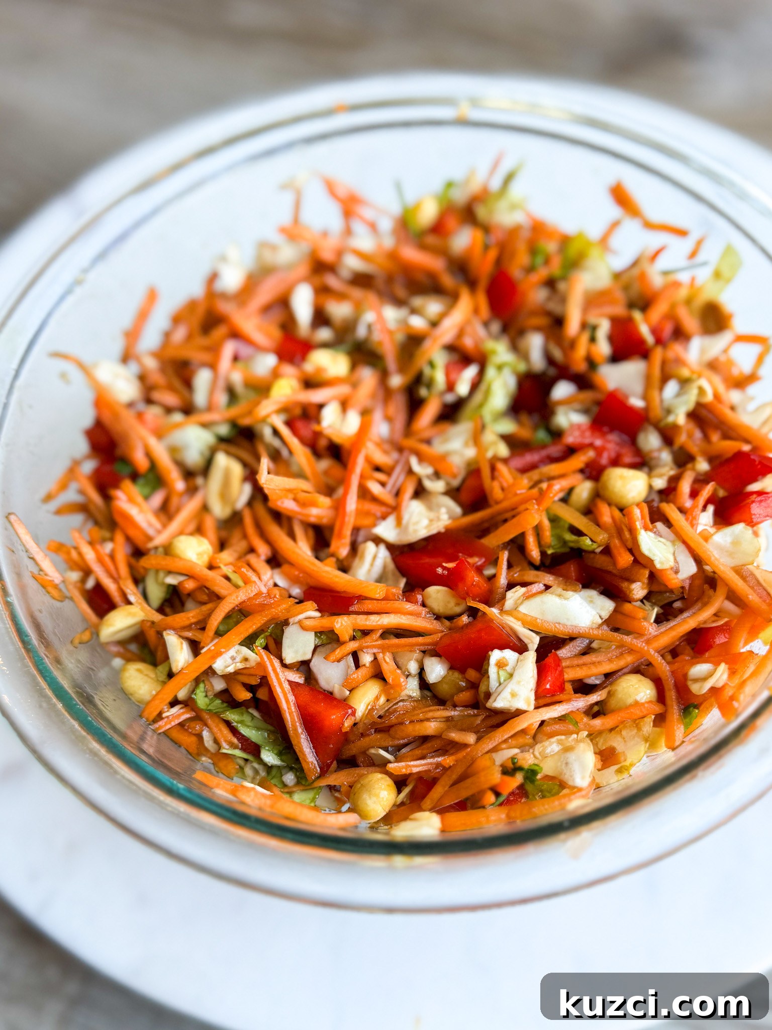 Crunchy Thai Carrot Salad with Peanut Lime Dressing 5 Bright bowl of Thai Crunch Carrot Salad ready to serve