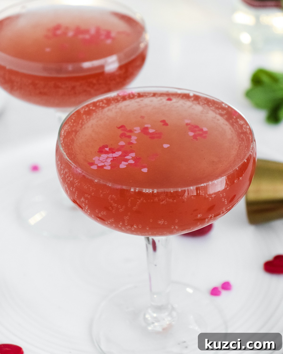 Vodka Cocktail Recipes: Classic and Creative Drinks to Try 3 the completed rose spritzer cocktail served in two champagne glasses