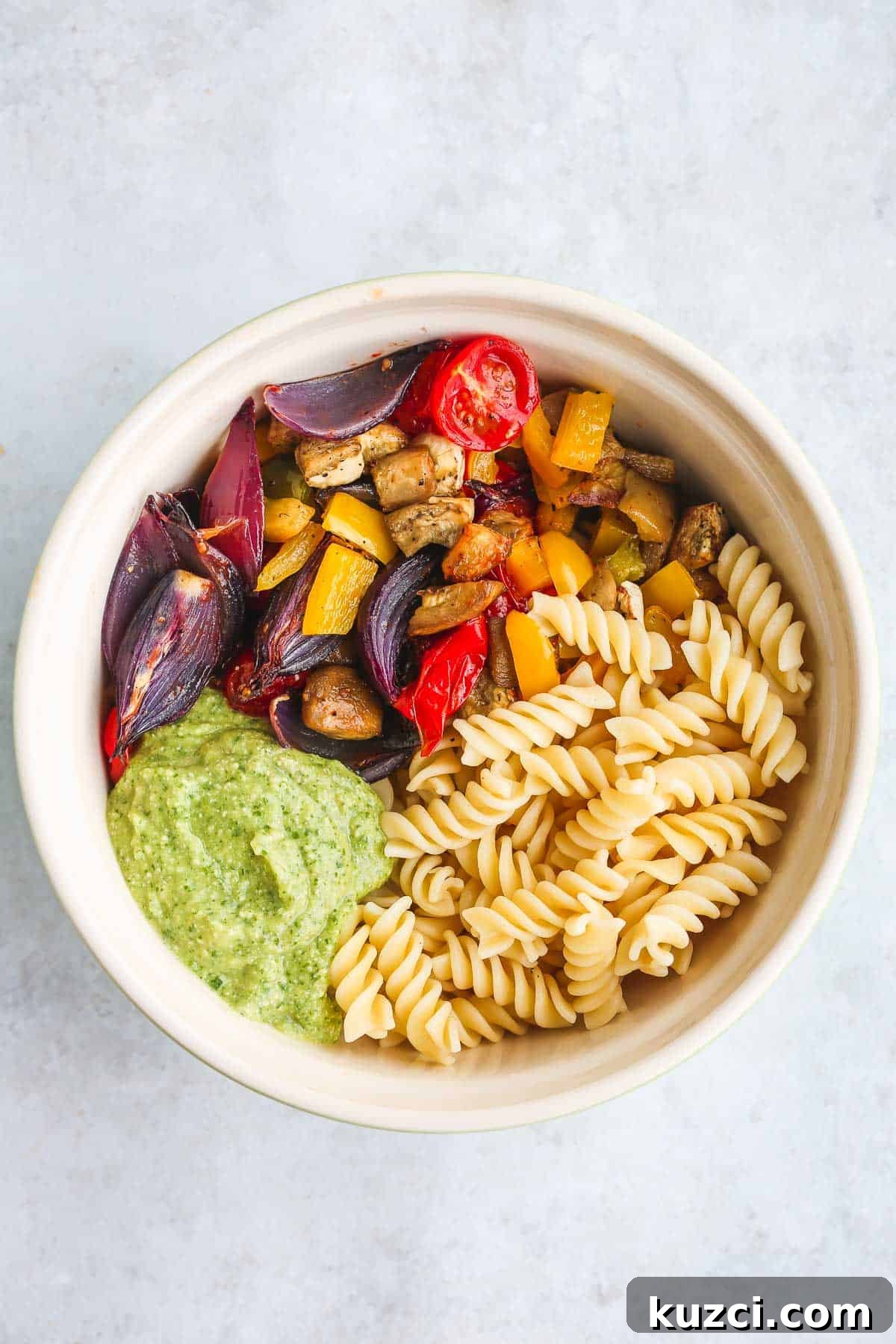 The salad mixed with avocado cilantro dressing