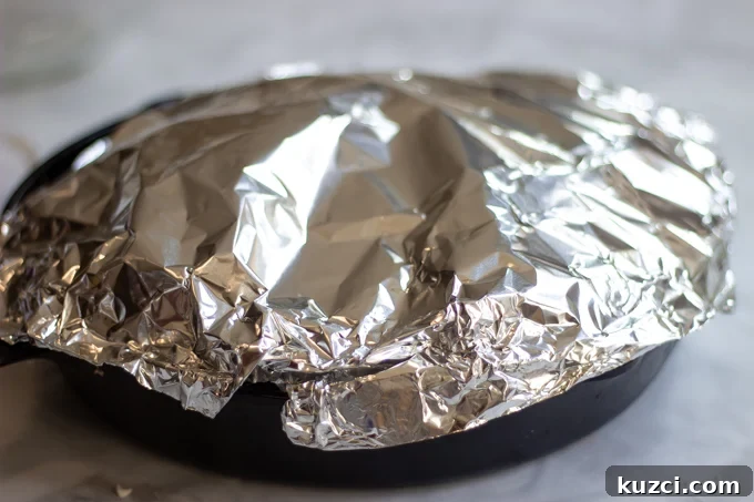 tented foil over the skillet