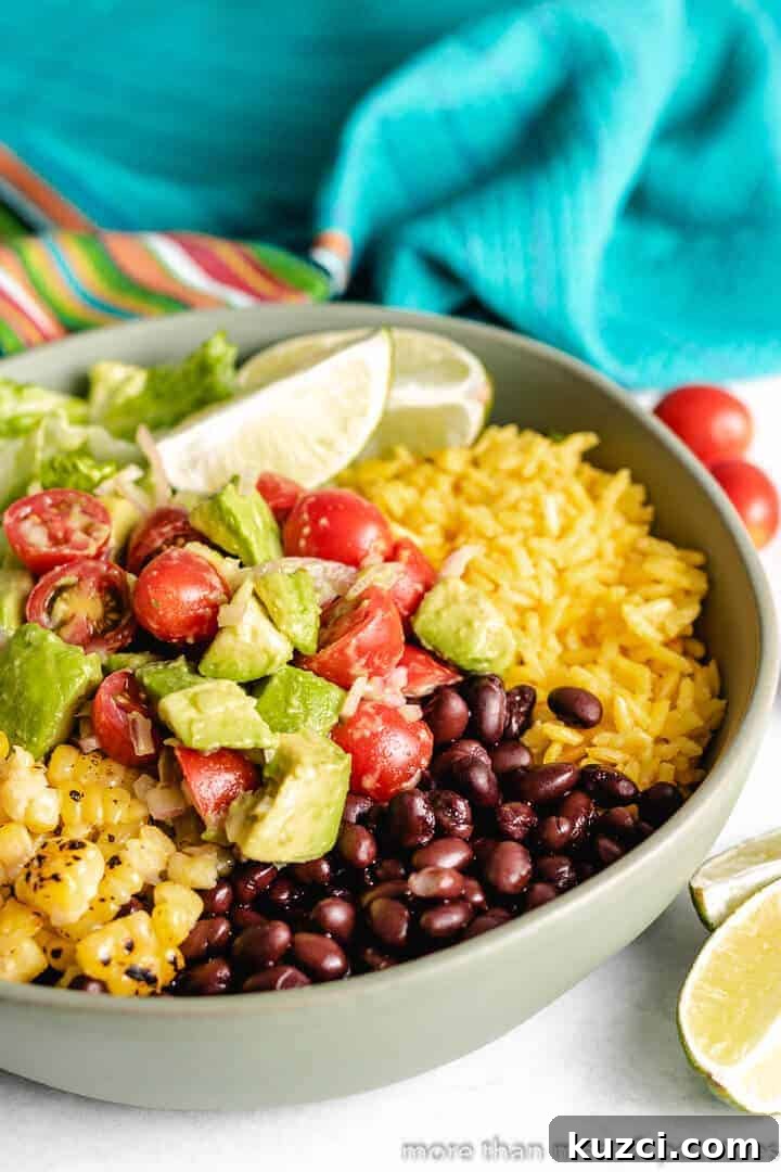Lettuce, tomatoes, and other ingredients in a serving dish.