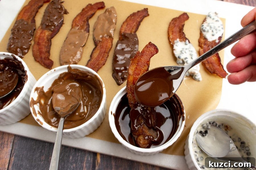 How to Make Chocolate-Covered Bacon at Home 4 bacon slices laid out on a parchment paper coated with chocolate