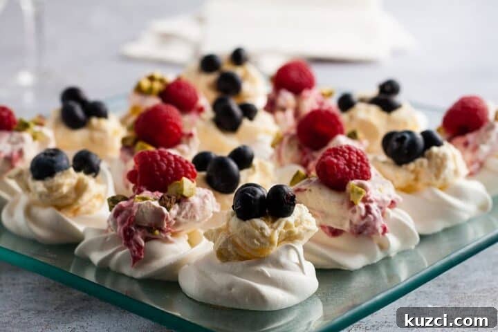 Mini pavlova bites with fruit.