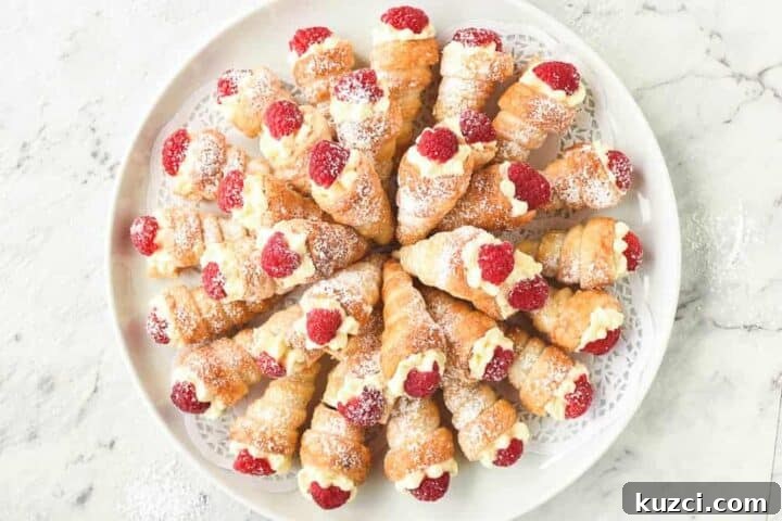 Mini cream horns filled with cream.