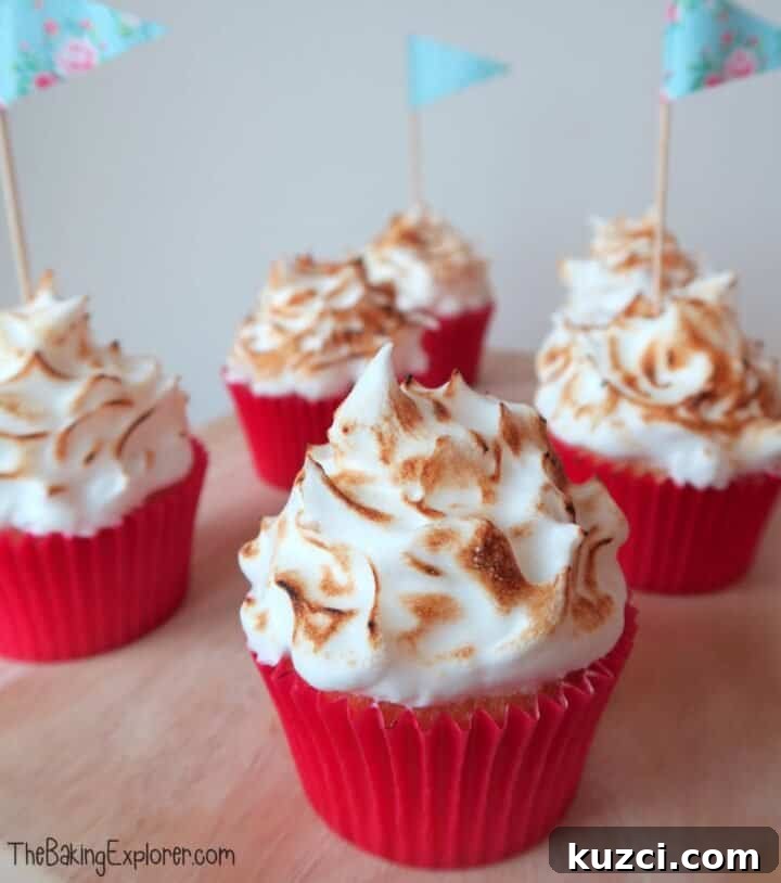Queen of puddings cupcakes topped with meringue.