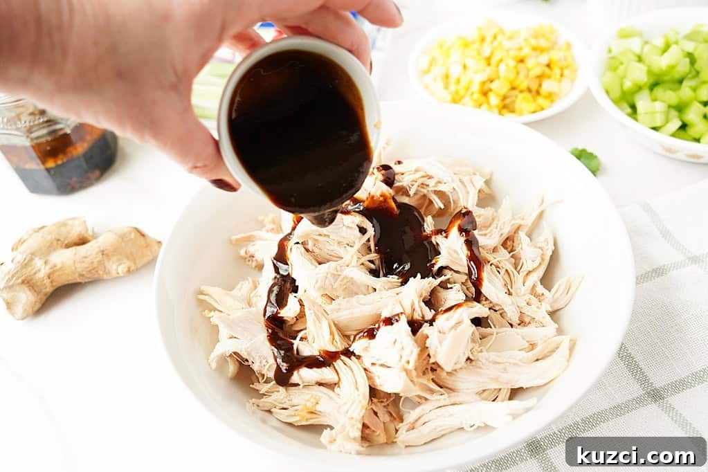 Teriyaki Crispy Rice Salad with Celery and Corn for Weeknights 6 Shred and coat the chicken with teriyaki sauce.