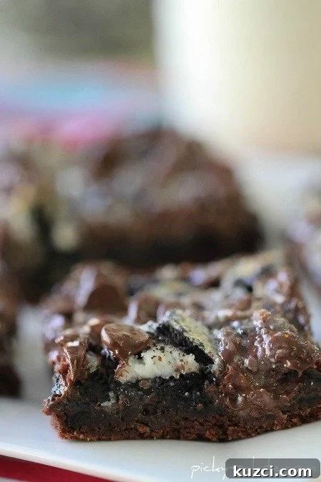Gooey Cookies and Cream Double Chocolate Cake Bars