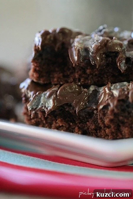 Gooey Cookies and Cream Double Chocolate Cake Bars