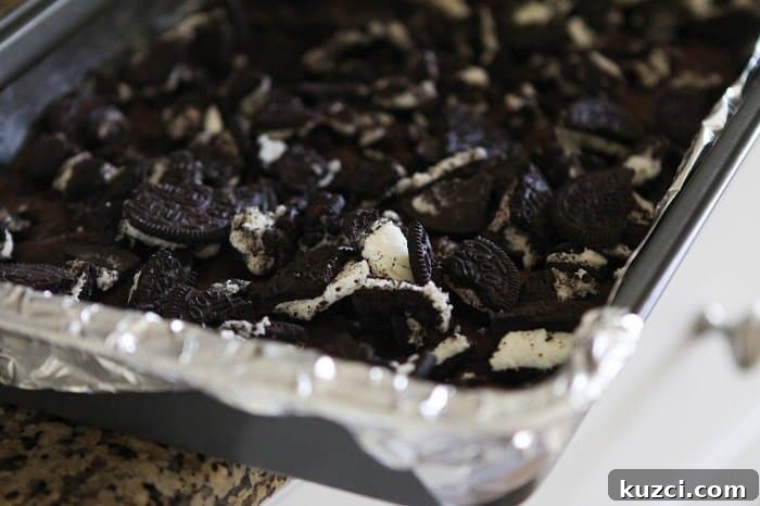 Gooey Cookies and Cream Double Chocolate Cake Bars