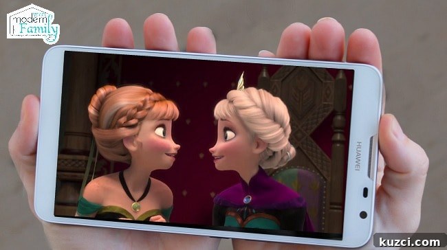 A cell phone playing a child's movie on it.