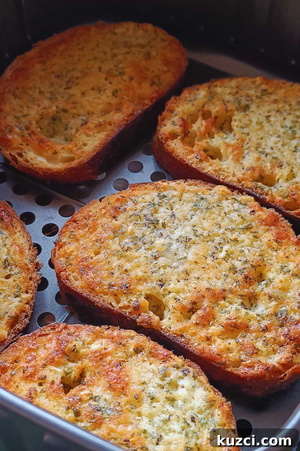 Crispy Air Fryer Garlic Bread Recipe 2 Image showing garlic bread in air fryer.