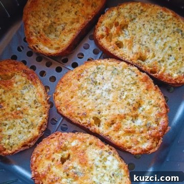 Crispy Air Fryer Garlic Bread Recipe 6 Image showing garlic bread toast in air fryer.