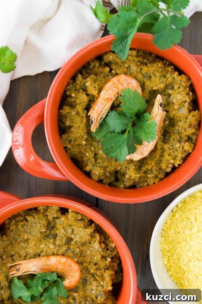 Caruru: Brazilian Shrimp and Okra Stew Recipe 3 Two orange crocks hold servings of Caruru topped with dried shrimp and cilantro