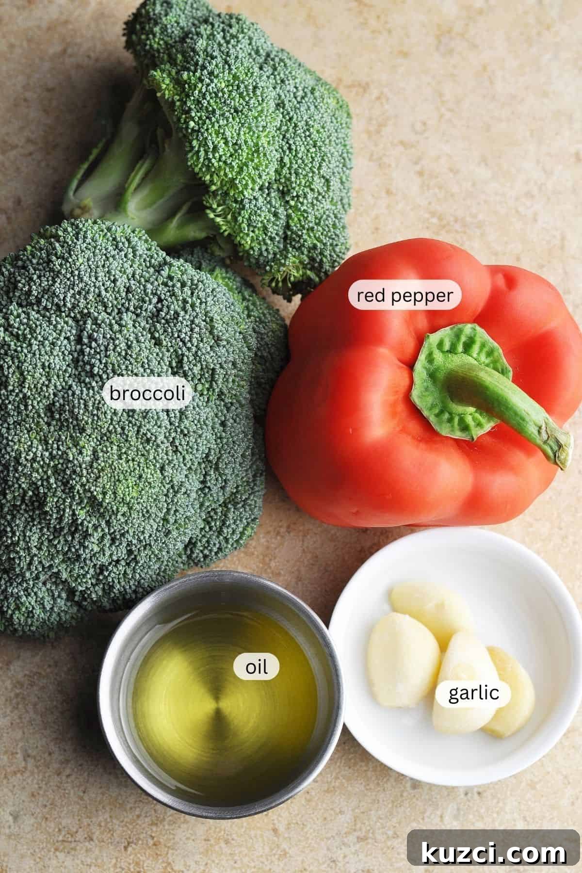 Raw broccoli, red bell pepper, garlic, and oil.