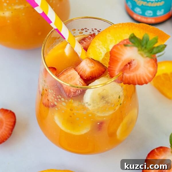 Protein-Packed Breakfast Cookies for Busy Mornings 11 fresh colorful fruit in a glass of orange juice