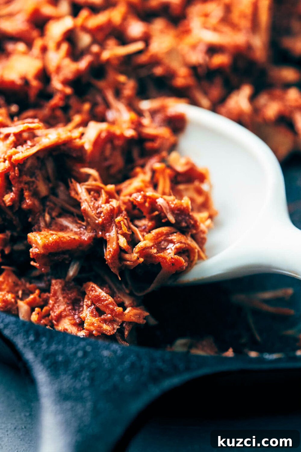 Plant-Based Pulled Pork Nachos 4 Vegan pulled pork being cooked down with homemade barbecue sauce in a cast iron pan