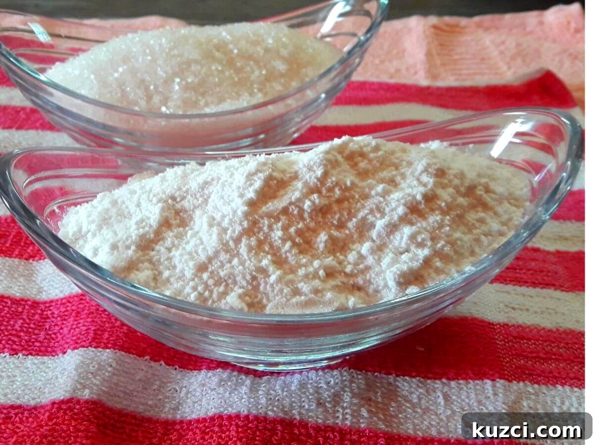 How to Make Boora (Tagar) at Home: Step-by-Step Guide 2 close-up of boora or tagar placed in a glass bowl. Another bowl full of sugar is kept on the side.