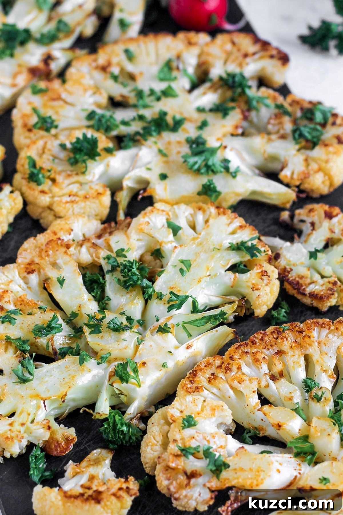Close up of roasted cauliflower steaks to show texture.