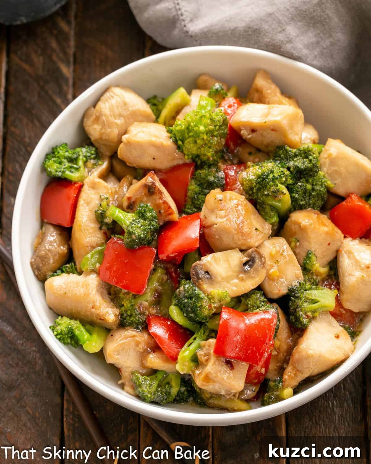 Chicken, Broccoli and Bell Pepper Stir Fry - an easy, flavorful dinner recipe that's family friendly and delicious! Overhead view of serving bowl full of chicken and broccoli stir fry.
