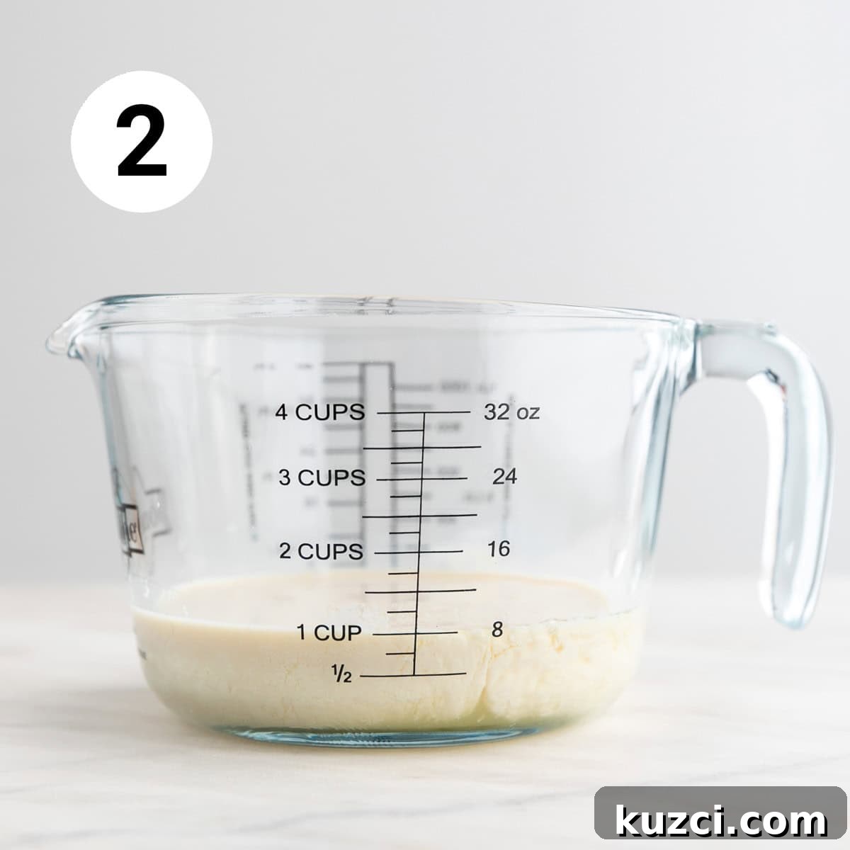 Measuring jar with vegan buttermilk.