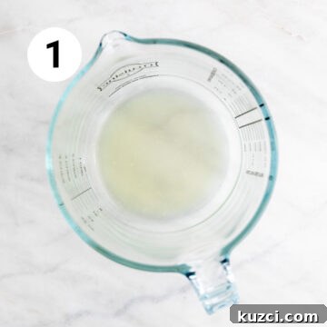 Measuring jar with lemon juice.