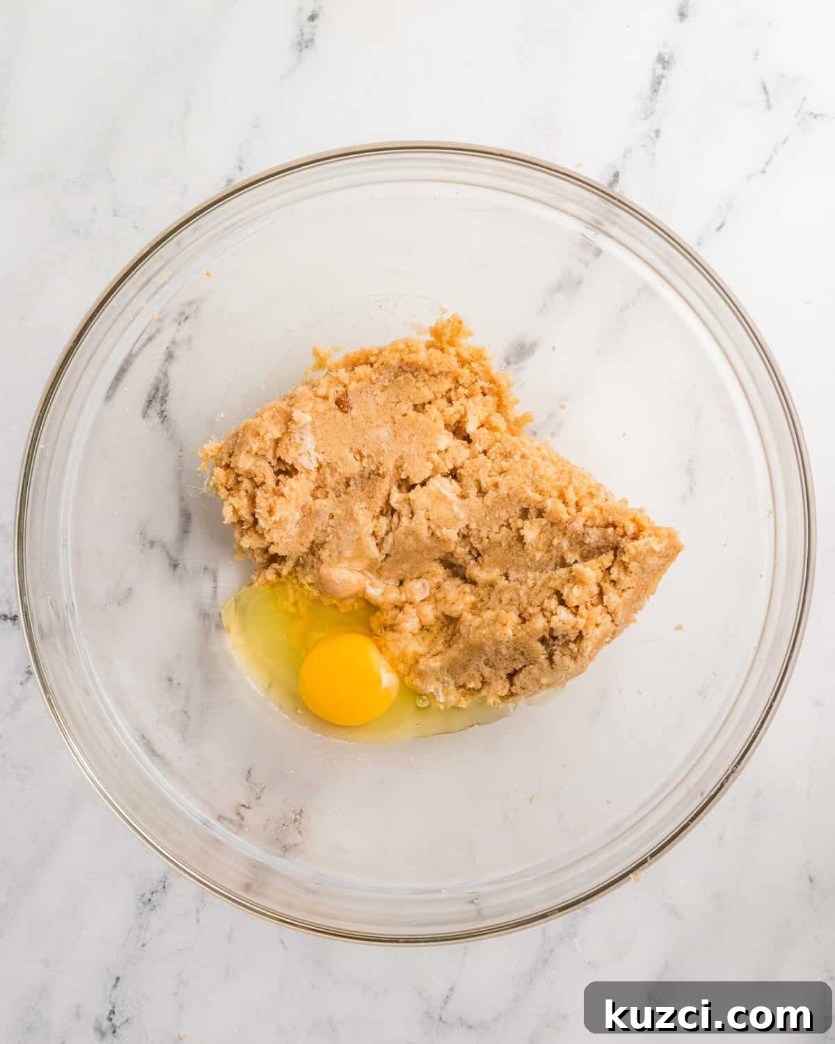 creamed butter and sugar with an egg on top. 