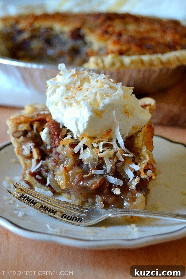 Creamy Coconut Pecan Pie Recipe 3 Slice of coconut pecan pie with fork on a white plate