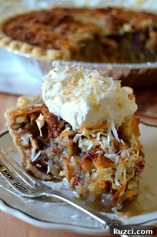 Creamy Coconut Pecan Pie Recipe 4 Closeup slice of coconut pecan pie on white plate with silver fork