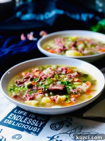 Potato soup with ham hock and petit pois (garden peas)