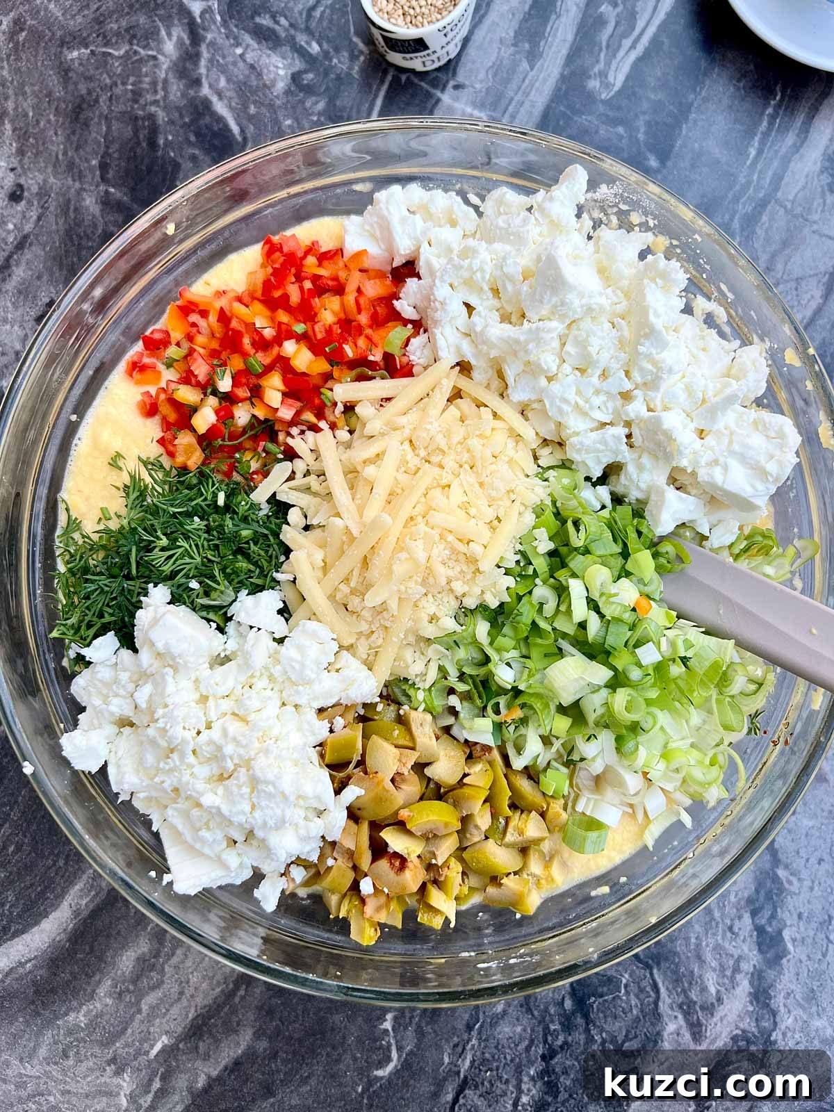 Flourless Lentil Bread Recipe 5 All the ingredients needed for lentil loaf recipe and the cheeses - all added into a glass bowl.