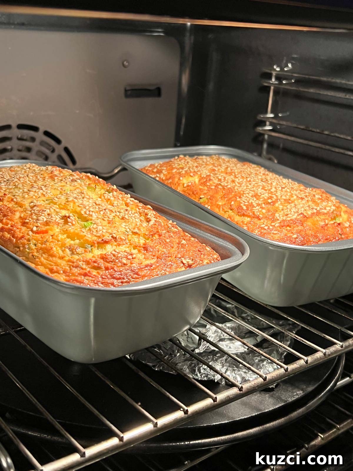 Flourless Lentil Bread Recipe 7 Two tins of lentil bread in the oven, baked and ready to come out.