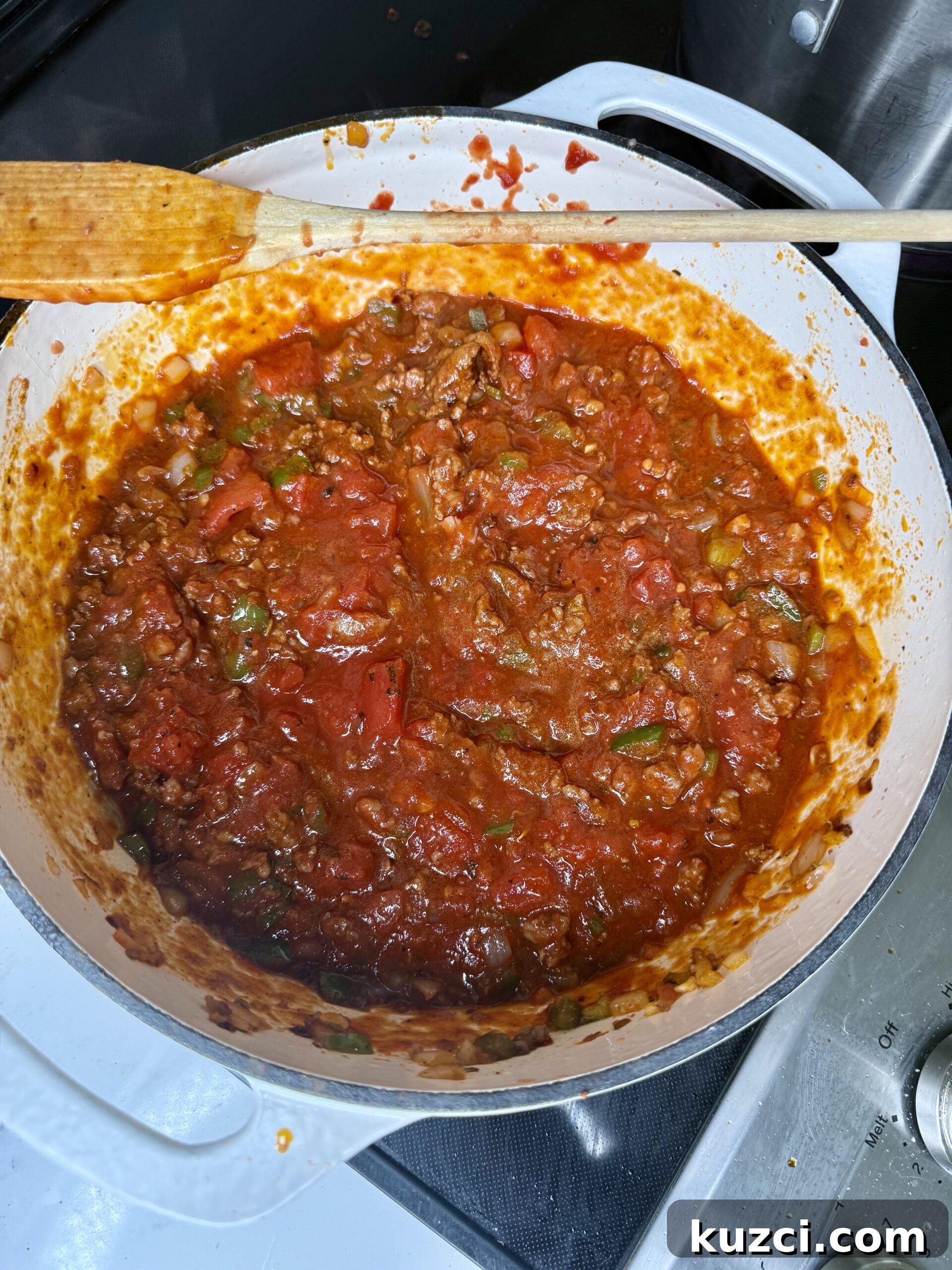 Creamy Sausage and Peppers Fettuccine 18 Simmering sausage and peppers sauce