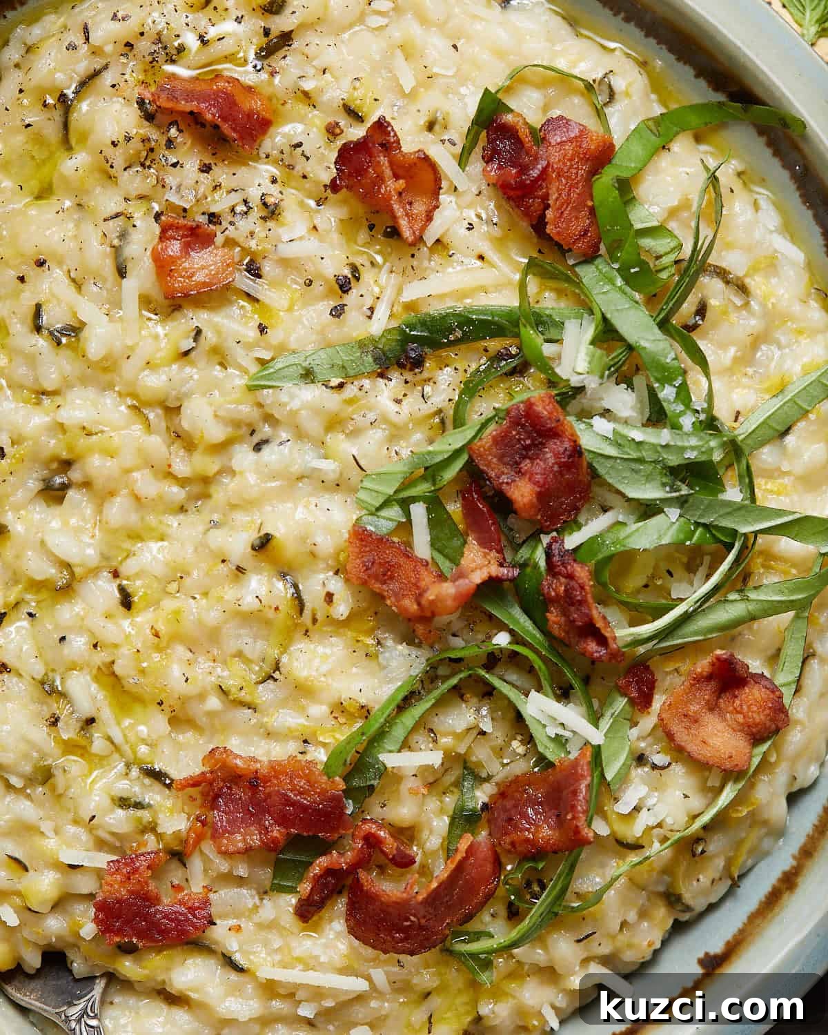 Zucchini Risotto Recipe: Creamy Stovetop Method 7 Up close image of zucchini risotto with garnish.
