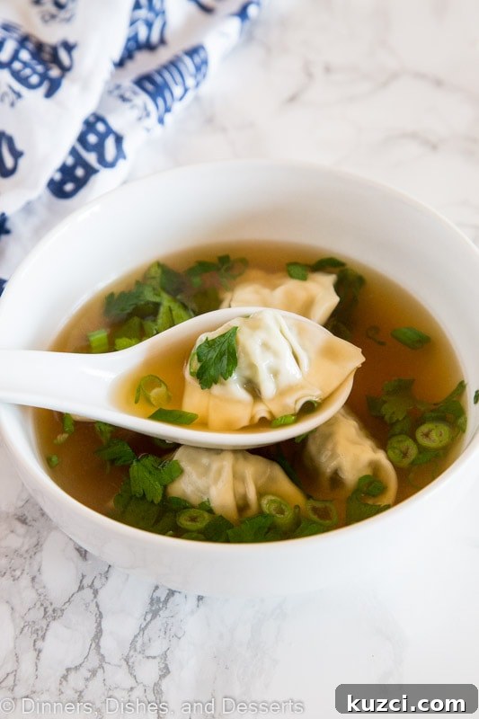 How to Make Authentic Wonton Soup 2 A bowl of soup, with Wonton and Dumpling